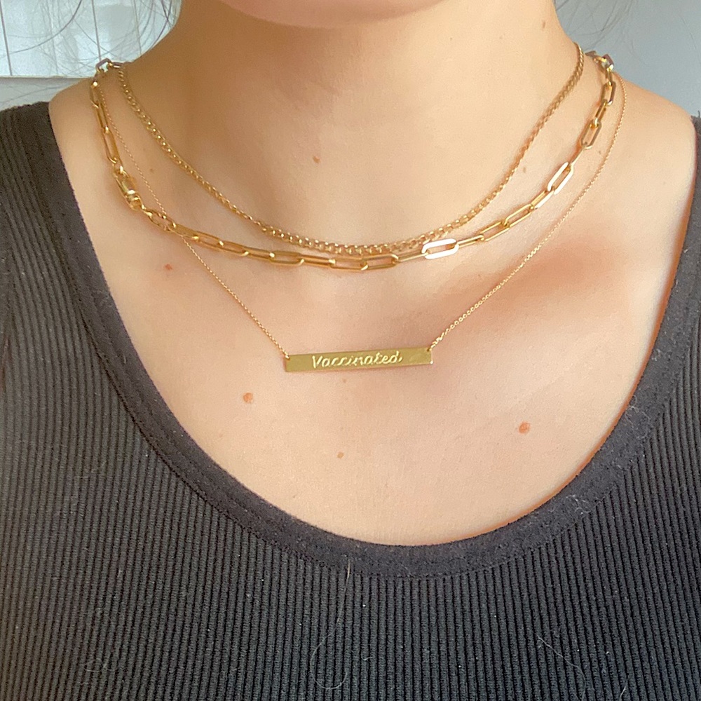 “Vaccinated” plate necklace 10k gold.